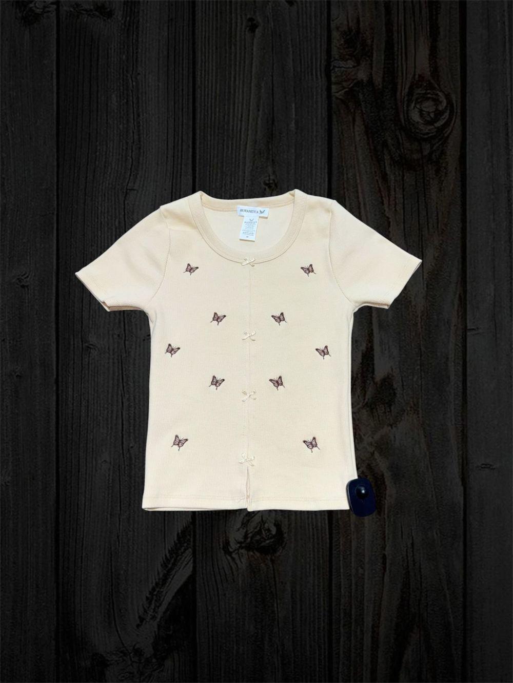 Blusa celeste con mariposas bordadas y lazos frontales